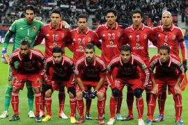 Egypt's Al Ahly starting players pose in a photo session prior to their 2012 Club World Cup semi-final football match against Brazil's Corinthians in Toyota on