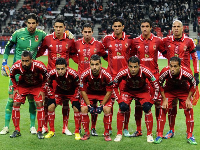 Egypt's Al Ahly starting players pose in a photo session prior to their 2012 Club World Cup semi-final football match against Brazil's Corinthians in Toyota on
