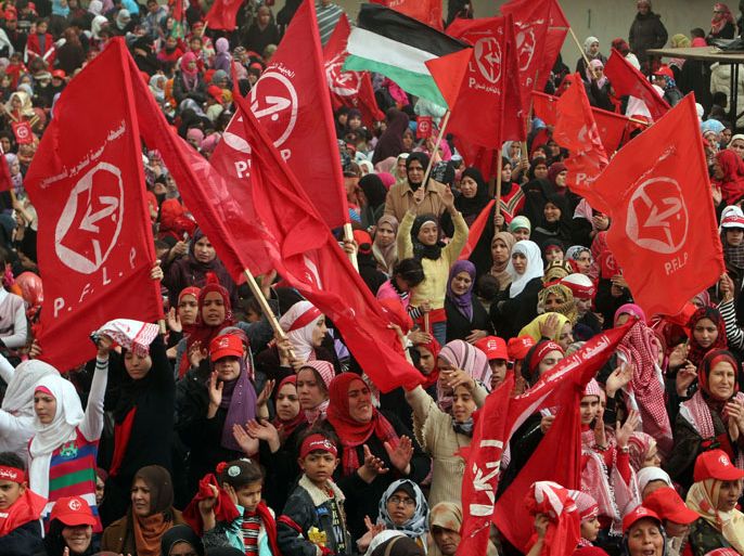 epa02489929 Supporters of the PFLP attend a rally marking the 42nd anniversary of the Popular Front for the Liberation of Palestine (PFLP) in Gaza City on, 11 December 2010. Thousands of Palestinian supporters of the Popular Front for the Liberation of Palestine (PFLP) attend a rally in Palestine Stadium to celebrate the group's foundation in 1967. EPA/MOHAMMED SABER
