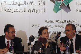 From R- L: Waleed Al-Bonni, a spokesman of the Syrian opposition government, Suheir Atassi (C), co-vice-president of the opposition government, and Khaled Al-Saleh, a member of the opposition coalition, address a news conference in Cairo December 1, 2012. The National Coalition of Syrian Opposition and Revolutionary Forces, which was formally announced in Doha on 11 November, held its first meeting in Cairo on Wednesday.