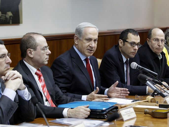 Israeli Prime Minister Benjamin Netanyahu (C) addresses the weekly cabinet meeting in Jerusalem on December 9, 2012. With a snap election looming next month, the Israeli government and opposition traded barbs over Hamas politburo chief Khaled Meshaal's landmark weekend visit to Gaza. AFP