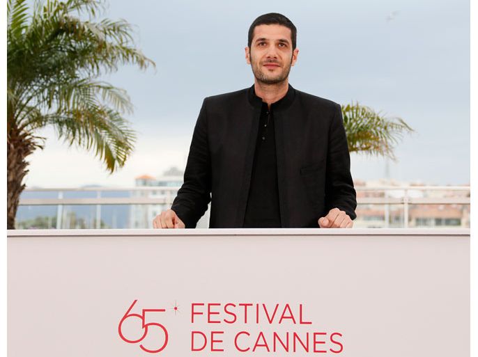 French director Nabil Ayouch poses during the photocall for 'Les Chevaux de Dieu' (God's Horses) at the 65th Cannes Film Festival, in Cannes, France, 20 May 2012. The movie is presented in the 'Un Certain Regard' section of the festival, which runs from 16 to 27 May. EPA/IAN LANGSDON