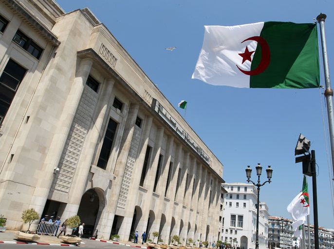 epa03236229 An exterior view shows the headquarter of the National People's Assembly (APN) in Algiers, Algeria, 26 May 2012. The Party of National Liberation Front (FLN) neared the absolute majority in the National Peoples Assembly (APN) by obtaining 220 seats, out of the 462 seats, the second-biggest group in the assembly will be the National Rally for Democracy (RND) led by Prime Minister Ahmed Ouyahia, which won 68 seats. Green Algeria, an Islamist alliance of three parties, won 48 seats. EPA/MOHAMED MESSARA