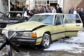 Damascus, -, SYRIA : A handout picture released by the Syrian Arab News Agency (SANA) shows damaged cars at the scene of two bomb blasts in Damascus' Qanawat district on December 12, 2012. At least one person was killed and several people were wounded by the blasts which also caused extensive material damage in the Syrian capital's southeastern suburb, according to the SANA state news agency. AFP PHOTO/HO/SANA == RESTRICTED TO EDITORIAL USE - MANDATORY CREDIT "AFP PHOTO / HO / SANA" - NO MARKETING NO ADVERTISING CAMPAIGNS - DISTRIBUTED AS A SERVICE TO CLIENTS ==