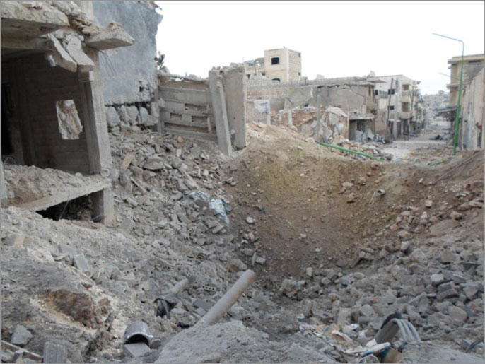 ‪النظام استخدم البراميل المتفجرة في قصف المدن والبلدات السورية‬ (الجزيرة)
