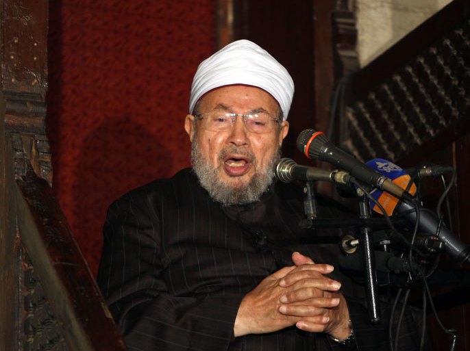 Cairo, -, EGYPT : Egyptian Muslim scholar Sheikh Yusuf al-Qaradawi addresses Muslims at Al-Azhar mosque during the weekly Friday prayer in Cairo on December 28, 2012. People demonstrated outside the Al-Azhar mosque in support of the Syrian people and against Syria's President Bashar al-Assad. AFP PHOTO/MAHMUD HAMS