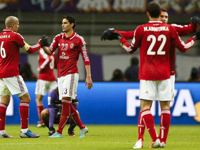 epa03502851 Al-Ahly SC players celebrate after the quarter final soccer match against Sanfrecce Hiroshima at the FIFA Club World Cup 2012 at Toyota Stadium in Toyota, central Japan, 09 December 2012. Al-Ahly won 2-1. EPA/KIMIMASA MAYAMA