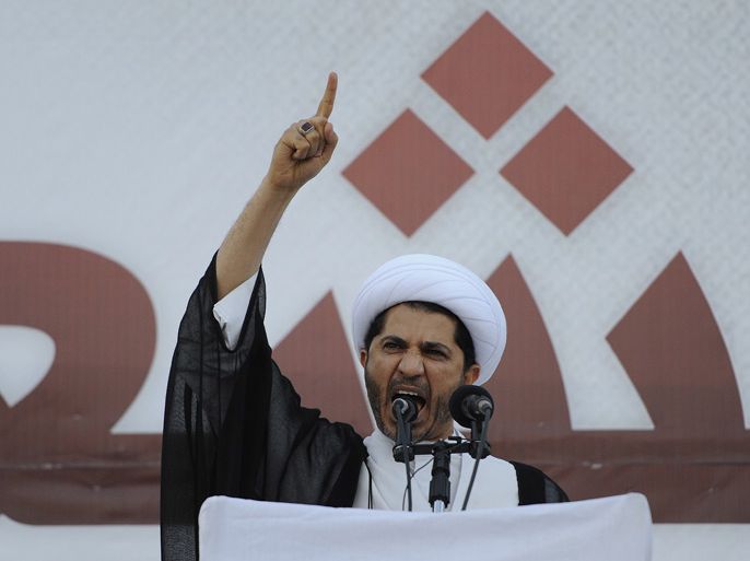 500681 Sheikh Ali Salman, secretary-general of the leading Shiite opposition grouping Al-Wefaq, addresses pro-reform protesters attending a sit-in for the opposition groups in Maqsha village, north the Bahraini capital Manama 7 December 2012. The 8th Manama Dialogue organized by the London based International Institute for Strategic Studies (IISS) which will run until 9 December 2012 opened in Bahrain with focus predominantly on Syria and broad regional security issues. Government officials from Syria have not been invited while Iran, Russia, and Iraq have opted to send in small delegations. Bahraini opposition groups which challenged a ban on protests hours before the opening session in near-by Maqsha village, north of Manama, by gathering thousands of its supporters for a sit-in criticized the international community for failing to address the situation in