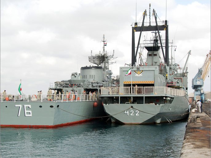 Two Iranian warships dock in the Sudanese Red Sea city of Port Sudan on December 8, 2012. The Iranian navy said the 1,400 ton frigate Jamaran and the 4,700 ton support ship Bushehr "docked in Port Sudan, after successfully carrying out their assignments in the Red Sea and were greeted by high-ranking Sudanese naval commanders." Khartoum said it was a "normal" port call but Israeli officials have expressed concern about arms smuggling through Sudan. AFP PHOTO/STR