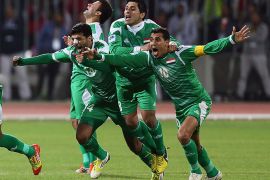 Iraqi players celebrate after winning over Bahrain in penalty shoot-out during their semi final match in the 21st Gulf Cup in Manama, January 15, 2013. Iraq will meet United Arab Emirates in the final. AFP PHOTO/MARWAN NAAMANI