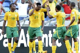South Africa Defender Siyabonga Sangweni (2nd L) celebrates after scoring a goal during the South Africa vs Angola Africa Cup of Nations 2013 group A football match at Moses Mahiba Stadium in Durban on January 23, 2013. AFP PHOTO/ FRANCISCO LEONG