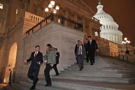 Washington, District of Columbia, UNITED STATES : WASHINGTON, DC - JANUARY 01: Members of the House of Representatives, including Rep. Jason Chaffetz (R-UT) (L), leave after voting for legislation to avoid the "fiscal cliff" during a rare New Year's Day session January 1, 2013 in Washington, DC. Voting 257-167, the House passed a bill that the Senate passed the night before, clearing the way for President Barack Obama to sign the legislation to avoid the "fiscal cliff." Chip Somodevilla/Getty Images/AFP== FOR NEWSPAPERS, INTERNET, TELCOS & TELEVISION USE ONLY ==