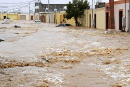 Cars are seen on a flooded street after heavy rain in Tabuk, 1500 km (932 miles) from Riyadh January 28, 2013.