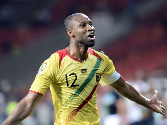 Mali's midfielder Seydou Keita celebrates after scoring a goal against Niger during the 2013 Africa Cup of Nations football match at Nelson Mandela Bay Stadium