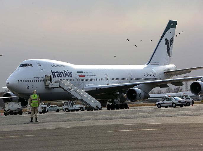An Iran Air Boeing 747 passenger plane sits on the tarmac of the domestic Mehrabad airport in the Iranian capital Tehran on January 15, 2013. Austrian Airlines said the previous day that it has stopped its flights to Tehran because they were not profitable any more in a decision that comes after the subsidiary of German carrier Lufthansa had already in November cut the number of weekly flights from Vienna to the Iranian capital to three. AFP PHOTO/BEHROUZ MEHRI