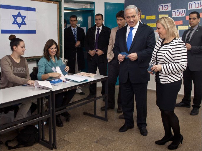 Israeli Prime Minister Benjamin Netanyahu, his wife Sara and their two sons arrive to vote at a polling station in Jerusalem, on January 22, 2013, as Israel residents started to vote in the 19th Israeli general election