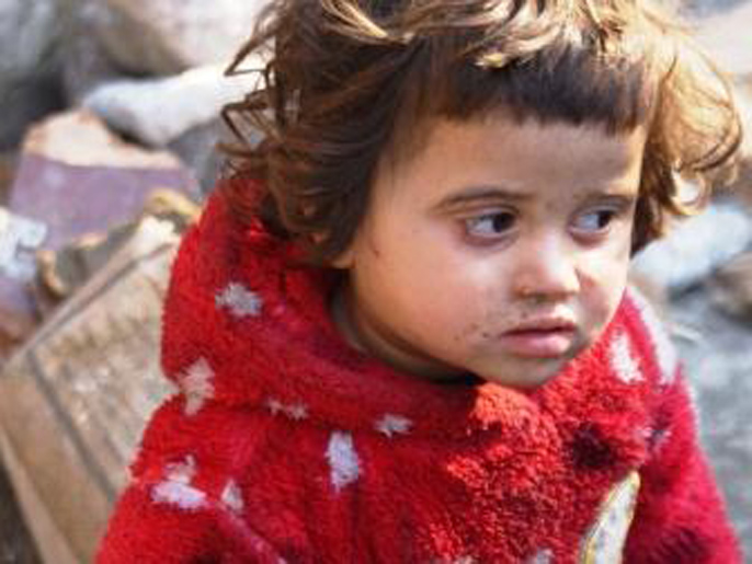 طفلة من حارة الطم بحي السكري، الصورة تتكلم عنها (الجزيرة نت)