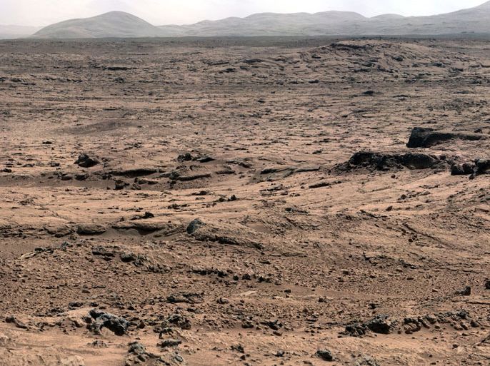 epa03488453 A handout photo provided by the National Aeronautics and Space Administration (NASA) on 27 November 2012 shows an image taken by the Mast Camera (Mastcam) on the NASA Mars rover Curiosity while the rover was working at a site called 'Rocknest' in October and November 2012. The center of the scene, looking eastward from Rocknest, includes the Point Lake area. After the component images for this scene were taken, Curiosity drove 83 feet (25.3 meters) on Nov. 18 from Rocknest to Point Lake. From Point Lake, the Mastcam is taking images for another detailed panoramic view of the area further east to help researchers identify candidate targets for the rover's first drilling into a rock. EPA/NASA/JPL-Caltech/Malin Space Science Systems/HANDOUT MANDATORY CREDIT: NASA/JPL-Caltech/Malin Space Science Systems, HANDOUT EDITORIAL USE ONLY