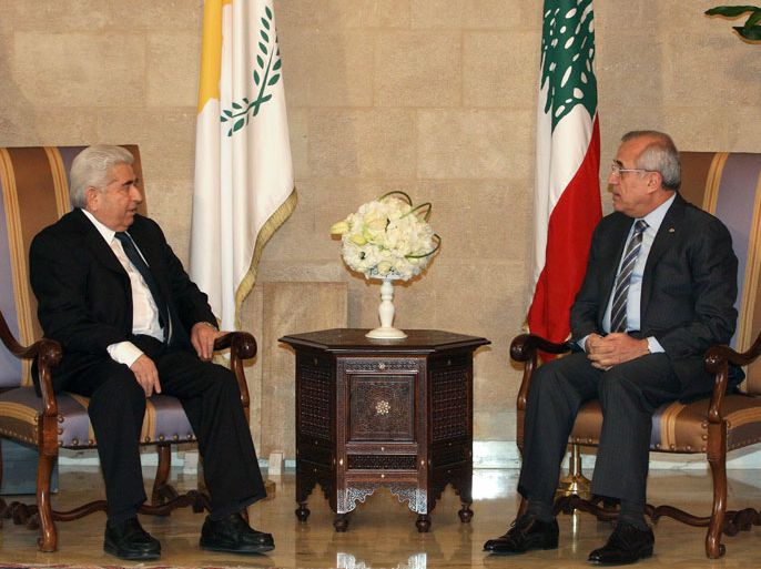 epa03529833 A handout picture released by Lebanese official photo agency Datati Nohra shows Lebanese President Michel Suleiman (R) meeting with Cypriot President Dimitris Christofias (L) at the presidential palace in Baabda, east of Beirut, Lebanon, 10 January 2013. Christofias arrived on 09 January for two-day official visit. EPA/DALATI NOHRA/HANDOUT HANDOUT EDITORIAL USE ONLY/NO SALES