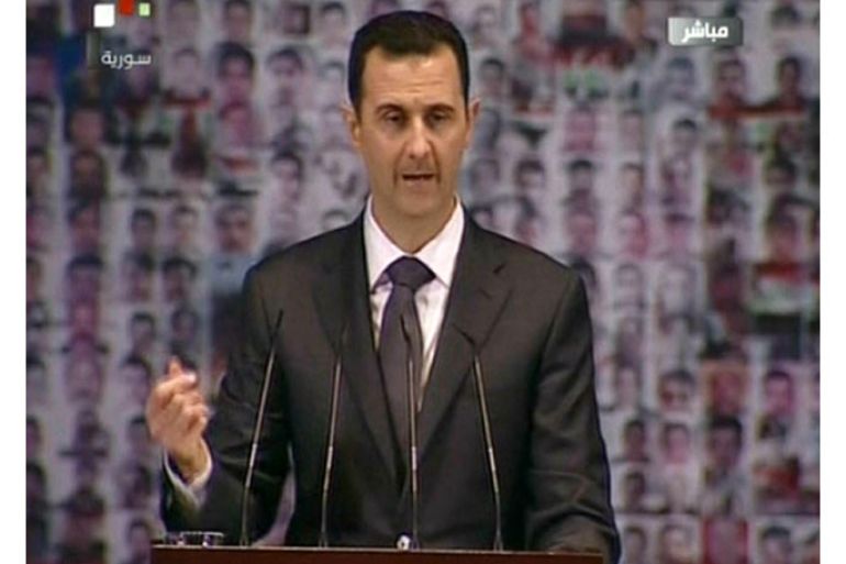 An image grab taken from the state-run Syrian TV shows Syria's embattled President Bashar al-Assad making a public address on the latest developments in the country and the region on January 6, 2013. The speech marks the first time the head of state, who has faced nearly two years of a popular revolt turned civil war, has made a public address since June. AFP PHOTO/SYRIAN TV