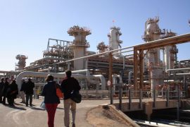 : (FILES) A picture taken on December 14, 2008 shows a foreign delegation visiting the Krechba gas treatment plant run by the Sonatrach, BP and Statoil, about 1,200 km (746 miles) south of Algiers. One person was killed and seven wounded on January 16, 2013, including two foreigners, when Islamist militants attacked a base for oil workers in southern Algeria, state media reported. The attack took place at dawn in the Tinguentourine region, some 40 kilometres (25 miles) from In Amenas, where British oil giant BP operates a gas field in partnership with Algeria's Sonatrach, the APS news agency reported, citing local officials.