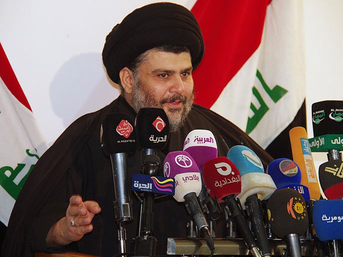 Iraqi Shi'ite cleric Moqtada al-Sadr speaks during a news conference in Najaf, some160 km (100 miles) south of Baghdad, January 1, 2013. Moqtada al-Sadr, head of a powerful Shi'ite movement in Iraq voiced his support for Sunni anti-government protesters, and warned of an "Iraqi Spring". REUTERS/Stringer (IRAQ - Tags: POLITICS RELIGION)