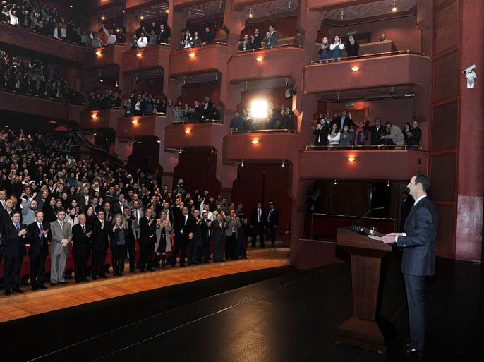 Syria's President Bashar al-Assad speaks at the Opera House in Damascus January 6, 2013, in this handout photograph released by Syria's national news agency SANA. A defiant al-Assad presented what he described as a new initiative on Sunday to end the war in Syria but his opponents dismissed it as a ploy to cling to power. REUTERS/Sana (SYRIA - Tags: POLITICS) FOR EDITORIAL USE ONLY. NOT FOR SALE FOR MARKETING OR ADVERTISING CAMPAIGNS. THIS IMAGE HAS BEEN SUPPLIED BY A THIRD PARTY. IT IS DISTRIBUTED, EXACTLY AS RECEIVED BY REUTERS, AS A SERVICE TO CLIENTS