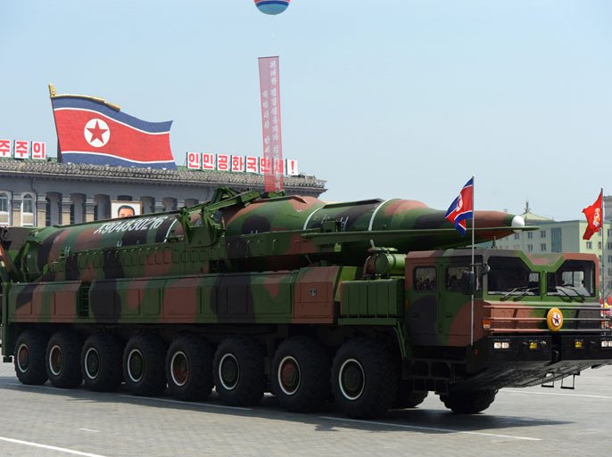 This file photo taken on April 15, 2012 shows a military vehicle carrying what is believed to be a Taepodong-class missile Intermediary Range Ballistic Missile (IRBM), about 20 meters long, during a military parade to mark the 100 birth of the country's founder Kim Il-Sung in Pyongyang. North Korea said on January 24, 2013 it planned to carry out a nuclear test and more rocket launches aimed at its "arch-enemy" the United States in response to tightened UN sanctions, but offered no timeframe