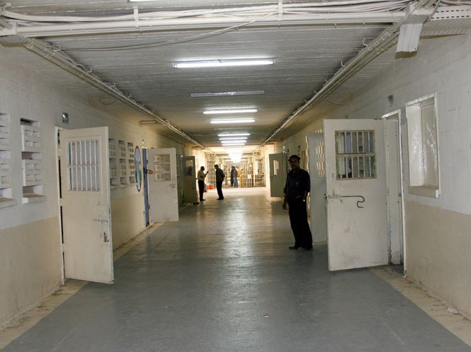 Iraqi prison guards stand outside cells of the 'Baghdad Central Prison', formerly known as Abu Ghraib prison in Baghdad, Iraq on 23 April 2009. Iraqi authorities formally reopened Abu Ghraib prison, where Iraqi prisoners were humiliated by US soldiers, renamed as Baghdad Central Prison in February 2009. EPA/MOHAMMED JALIL
