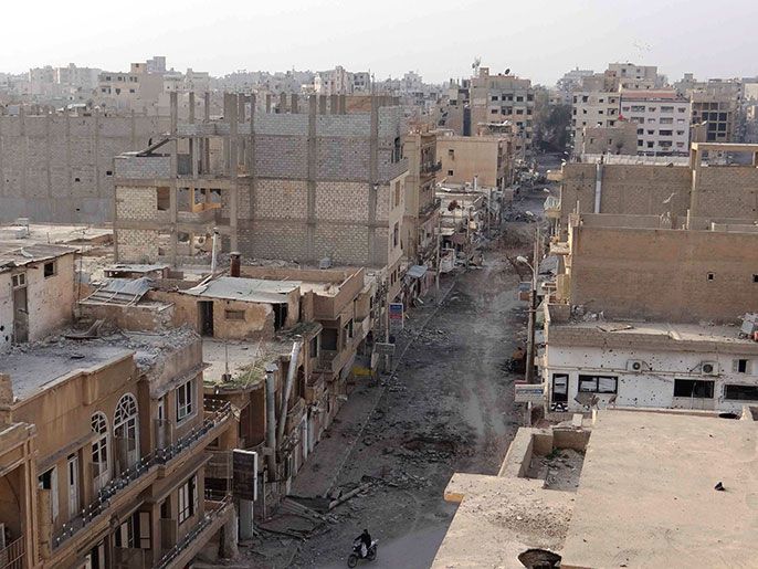 جانب من حجم الدمار الذي لحق بأحياء دير الزور (رويترز)