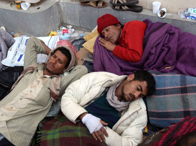 Yemeni people, some of them on hunger strike, take part in a sit-in in front of the prime minister residence to ask for medical treatment for those who were wounded during the 2011 uprising in the capital Sanaa, on February 2, 2013.