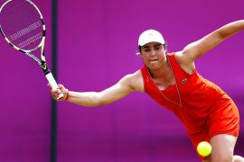 LONDON, ENGLAND - JULY 30: Ons Jabeur of Tunisia competes during her Women's Singles Tennis second round match against Sabine Lisicki of Germany on Day 3 of the London 2012 Olympic Games at the All England Lawn Tennis and Croquet Club in Wimbledon on July 30, 2012 in London, England.