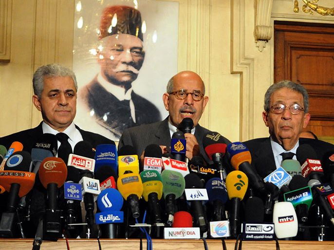 Egyptian opposition leader and Nobel Prize laureate Mohamed ElBaradei (C), former presidential candidate Egyptian Member of Parliament Hamdeen Sabbahy (L) and former Arab League secretary general Amr Mussa attend a press conference in Cairo on January 28, 2013. Egypt's main opposition bloc has called for demonstrations nationwide on February 1, to achieve the "goals of the revolution", after turning down an invitation by President Mohamed Morsi for talks. AFP PHOTO / STR