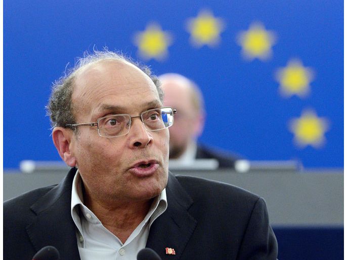 Strasbourg, Bas-Rhin, FRANCE : Tunisian President Moncef Marzouki speaks at the European Parliament in Strasbourg, eastern France on February 6, 2013. Marzouki denounced "the odious assassination" of his friend and opposition leader Chokri Belaid in an impassioned speech Wednesday that brought tears to the eyes of Europe's politicians. AFP PHOTO / PATRICK HERTZOG