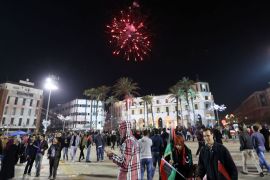 Libyans celebrate in Tripoli's landamark Martyrs square the upcoming second anniversary of the Libyan revolution on February 15, 2013. Libya on Sunday will mark the second anniversary of the uprising that toppled the regime of strongman Moamer Kadhafi, amid fears of fresh violence and calls for demonstrations across the country. The government has already taken a series of measures to contain any attempt by supporters of the former regime to "sow chaos" amid anger from protesters who accuse the new rulers of failing to push for reform. AFP PHOTO/MAHMUD
