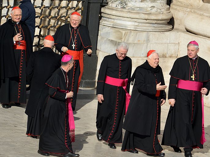US Cardinal Bernard Francis Law (2D-R) arrives with other cardinals on St Peter's square ahead of Pope Benedict XVI last weekly audience on February 27, 2013 at the Vatican. Pope Benedict XVI will hold the last audience of his pontificate in St Peter's Square on Wednesday on the eve of his historic resignation as leader of the world's 1.2 billion Catholics. AFP PHOTO / ALBERTO PIZZOLI