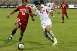 epa01043808 Lebanese player Ramez AYoub (L) fights for ball with Jordanian Player Odai Yousef during their West Asian football federation soccer match,in Amman on 20 June 2007. Jordan won 3-0. EPA/JAMAL NASRALLAH