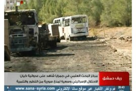 Damascus, -, SYRIA : An image grab taken from the state-run Syrian TV on February 2, 2013, shows damaged vehicles after what Syria said was an Israeli air raid which targeted the Jamraya scientific research base on the outskirts of Damascus on February 1. According to a US official who spoke on condition anonymity, the Israeli raid targeted surface-to-air missiles on vehicles and an adjacent military complex suspected of housing chemical agents. AFP PHOTO/SYRIAN TV == RESTRICTED TO EDITORIAL USE - MANDATORY CREDIT "AFP PHOTO/SYRIAN TV - NO MARKETING NO ADVERTISING CAMPAIGNS - DISTRIBUTED AS A SERVICE TO CLIENTS ==