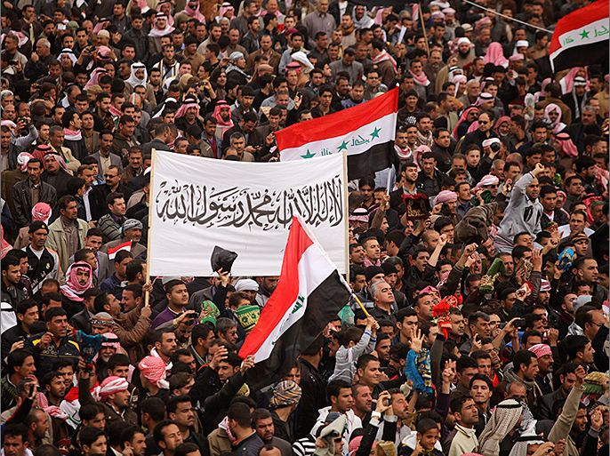Iraqi Sunni Muslims take part in an anti-government demonstration in Ramadi, 100 km (62 miles) west of Baghdad, February 15, 2013. Thousands of Sunni Muslims protested after Friday prayers in huge rallies against Shi'ite Iraqi Prime Minister Nuri al-Maliki, demanding that he step down. REUTERS/Mohammed Al-Kubaisi (IRAQ - Tags: POLITICS CIVIL UNREST)