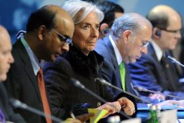 : International Monetary Fund (IMF) Managing Director Christine Lagarde (C) attends a meeting of G20 states finance ministers and central bank governors' deputies in Moscow, on February 16, 2013. The ministers and central bank governors' deputies gathered today in Moscow for their first meeting in the Russian capital aimed at reassuring markets that the world's economic powers would not slug it out in "currency wars" to boost national growth. AFP HOTO/YURI KADOBNOV