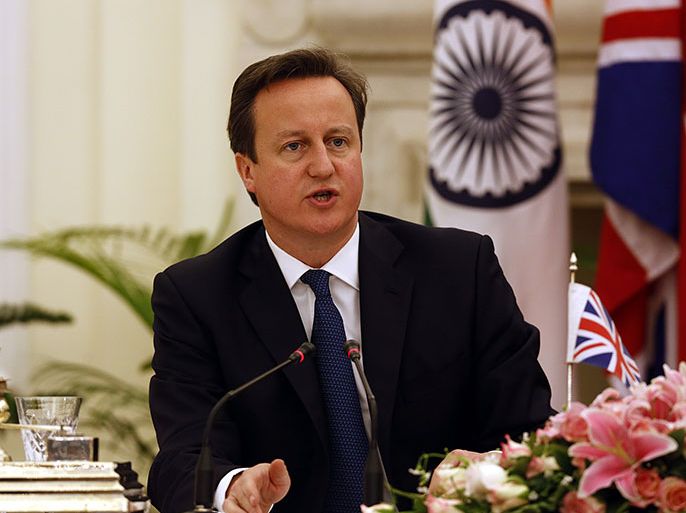 epa03590193 British Prime Minister David Cameron speaks during a joint statement with Indian Prime Minister Manmohan Singh (not seen), at Hyderabad House in New Delhi, India, 19 February 2013. Cameron and a 100-member business delegation arrived in the Indian capital after a day-long trip to Mumbai, where he said Britain would introduce same-day visa services for Indian investors. EPA/HARISH TYAGI