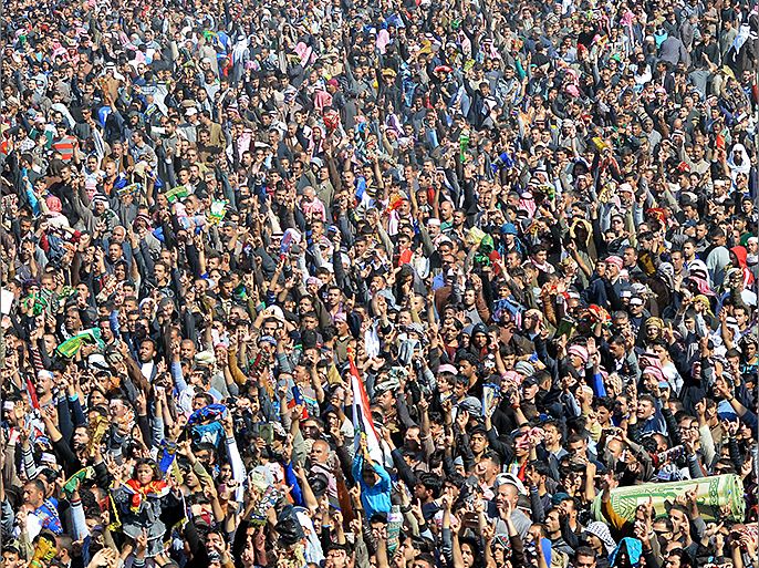 Iraqi anti-government protesters shout slogans following the weekly Friday prayers in the western city of Ramadi on February 22, 2013 as thousands of Sunni Muslims took to the streets to decry the alleged targeting of their minority. Iraq continues to face rallies in Sunni-majority areas calling for the ouster of Iraqi Prime Minister Nuri al-Maliki, a Shiite. AFP PHOTO/AZHAR SHALLAL