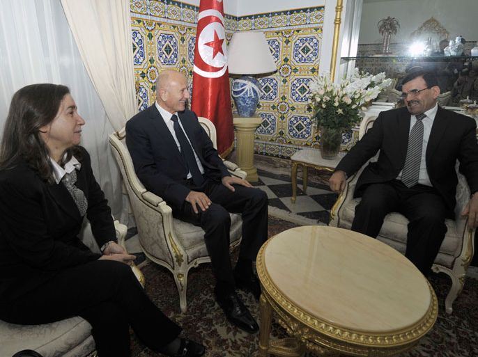 Tunisia's new Prime Minister Ali Larayedh meets with Progressist Democratic Party (PDP) General Secretary Maya al-Jeribi (L) and PDP leader Nejib Chebbi (C), on February 26, 2013 in Tunis. On the day of Belaid's murder, then prime minister Hamadi Jebali proposed the formation of a government of technocrats as a way out of the crisis. But the initiative was rejected by his own Ennahda party, leading to his resignation. AFP PHOTO / FETHI BELAIDTunisia's new Prime Minister Ali Larayedh meets with Progressist Democratic Party (PDP) General Secretary Maya al-Jeribi (L) and PDP leader Nejib Chebbi (C), on February 26, 2013 in Tunis. On the day of Belaid's murder, then prime minister Hamadi Jebali proposed the formation of a government of technocrats as a way out of the crisis. But the initiative was rejected by his own Ennahda party, leading to his resignation. AFP PHOTO / FETHI BELAID