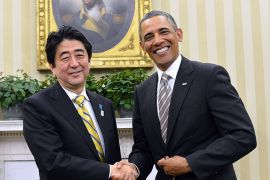 US President Barack Obama shakes hands wtih Japan's new conservative Prime Minister Shinzo Abe following their bilateral meeting in the Oval Office at the White House in Washington on February 22, 2013. AFP PHOTO/Jewel Samad