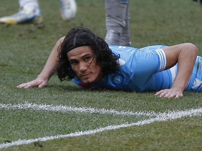 Napoli's Uruguayan forward Edinson Cavani lies on ground during the Italian Serie A football match SSC Napoli vs UC Sampdoria in San Paolo Stadium on February 17, 2013 in Naples. The match ended in a 0-0 draw. AFP PHOTO / CARLO HERMANN