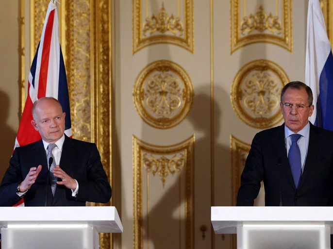 British Foreign Secretary William Hague (L) and his Russian Federation Sergei Lavrov (R) hold a joint press conference at the Foreign and Commonwealth Office in London on March 13, 2013. Russia's foreign and defence ministers visited Britain for high-level talks in a further thawing of ties once frozen by the murder of dissident Alexander Litvinenko in London