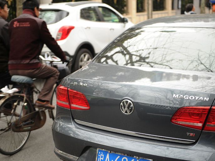 A Volkswagen Magotan is seen parked on a street in Shanghai on March 20, 2013. Volkswagen said it would recall 384,181 vehicles in China over gearbox defects, marking the German auto giant's biggest ever recall in the world's largest auto market.AFP PHOTO/Peter PARKS
