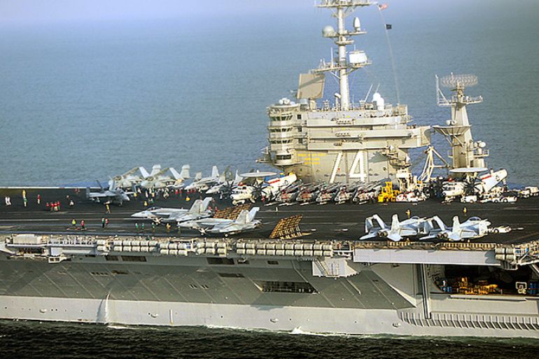 (FILES) -- File picture dated December 29, 2011 shows the USS John Stennis aircraft carrier as it allegedly went "inside the manoeuvre zone" where Iranian ships are conducting 10 days of wargames in the Gulf, accoridng to Iranian officials. The US military will maintain only one aircraft carrier in the Gulf instead of two due to potential deep budget cuts that could kick in next month, Pentagon officials said on February 6, 2013. The deployment of the USS Harry S. Truman USS was has been cancelled while the USS John Stennis aircraft carrier remains in the Gulf, and is due to be relieved by the USS Dwight Eisenhower by early March, officials said. AFP PHOTO/FARS NEWS
