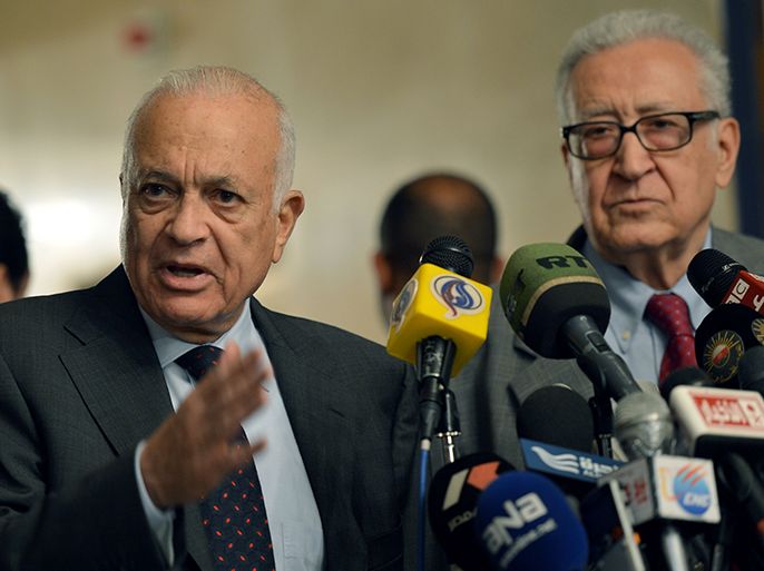 Special Representative of the United Nations and the League of Arab States on Syria Lakhdar Brahimi (R) and Arab League General Secretary Nabil al-Arabi attend a Joint press conference after a meeting on March 18, 2013, in the Egyptian capital Cairo. AFP PHOTO / KHALED DESOUKI