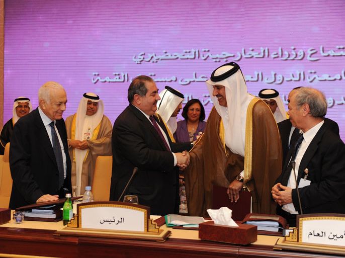 العراق تسلم رئاسة القمة إلى قطر.